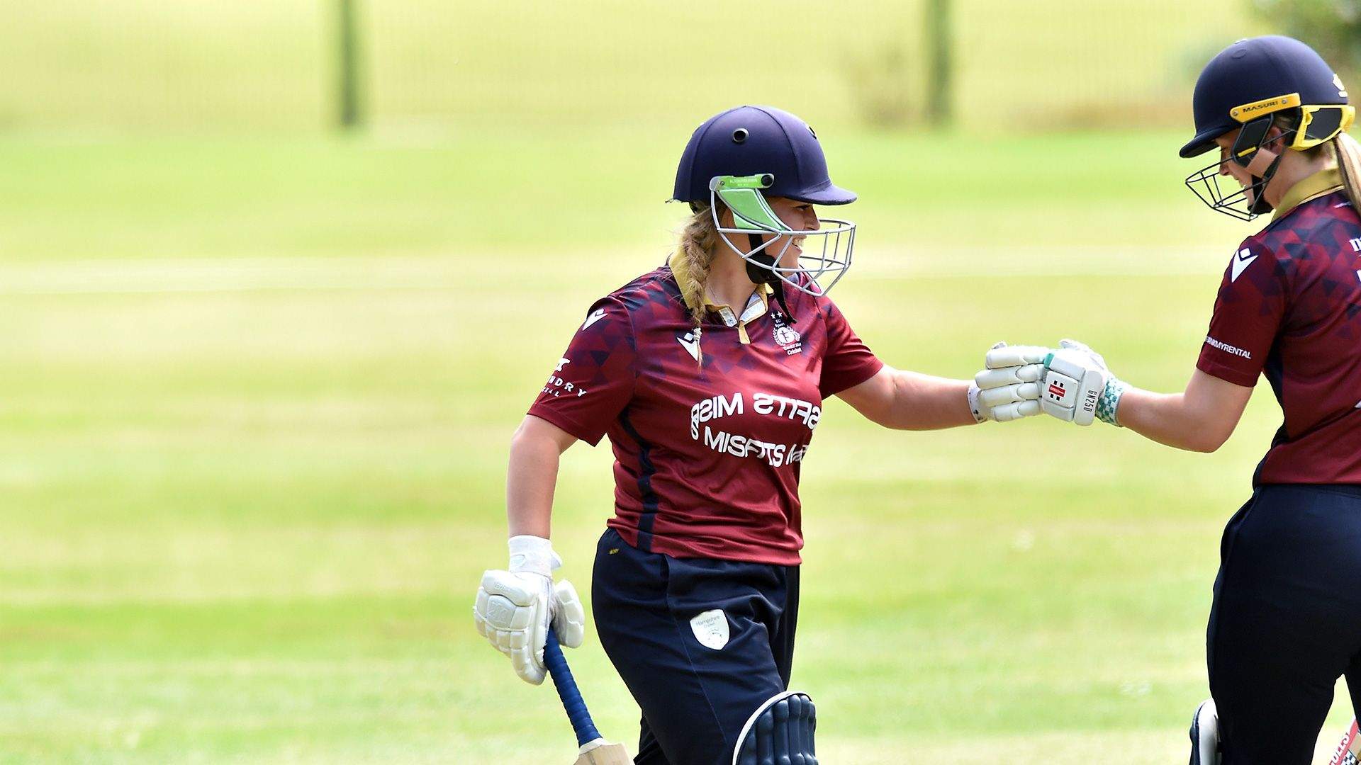 Two female cricket players