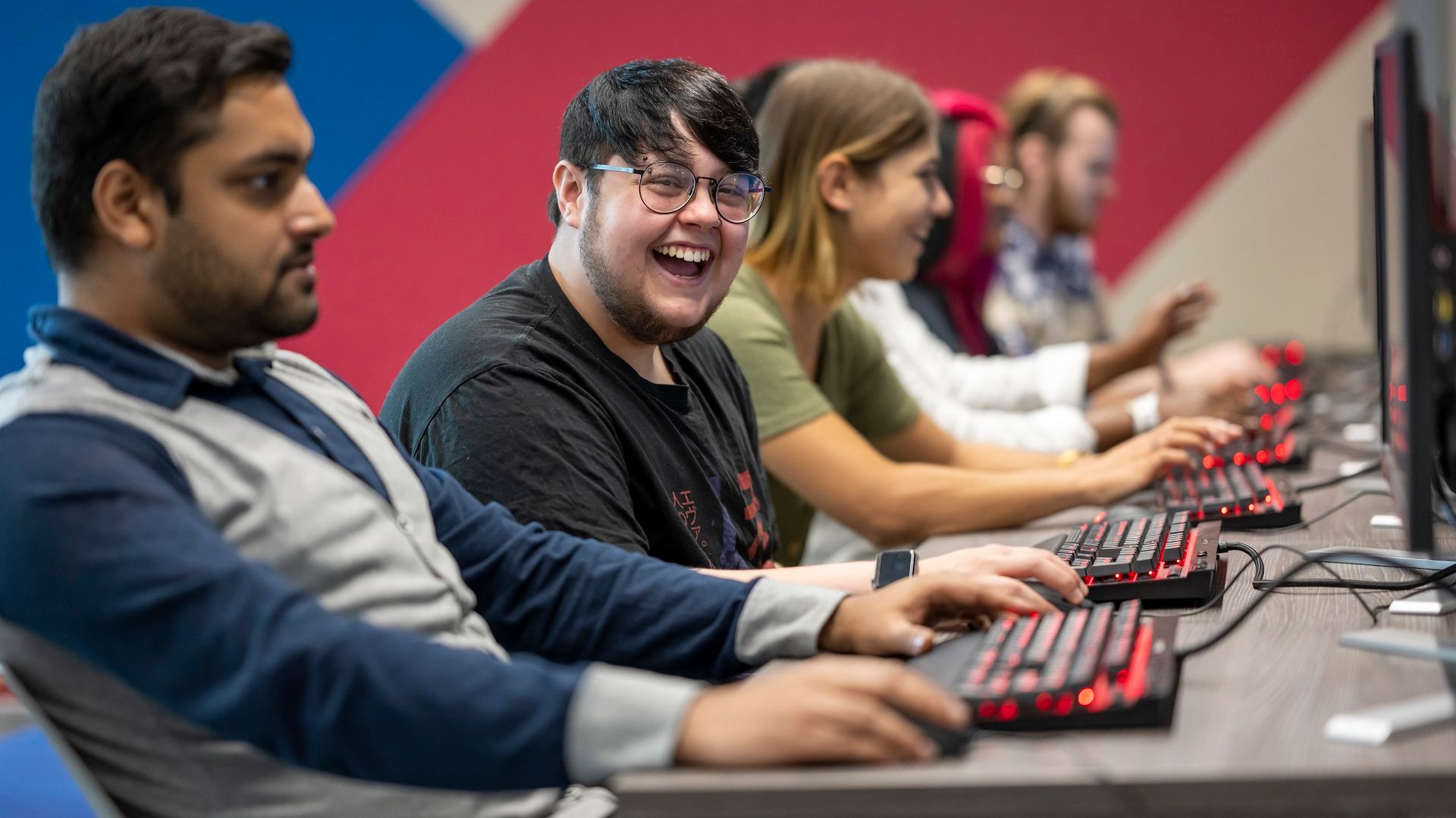 Row of students sat at their computer desks