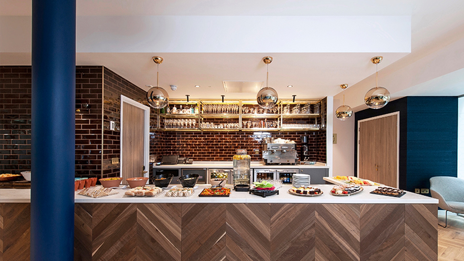 A spread of fresh food on display in front of a drinks bar