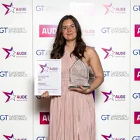 Madalina Voicu receiving her AUDE Award
