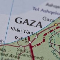 Close up the word Gaza on a paper map, highlighting Rafah were Israel has been committing genocide.