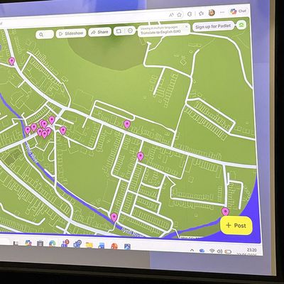 A digital map displaying the layout and streets of a city, with various landmarks marked for navigation.