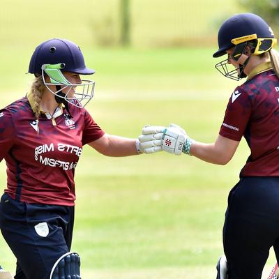 Two female cricket players