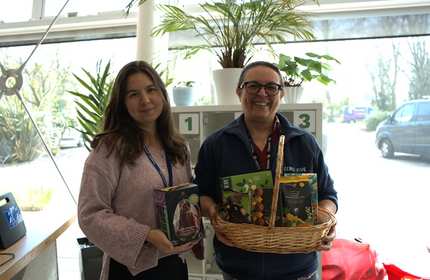 Two women holding Fairtrade-branded foods