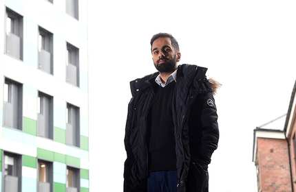 Aamir Mohammed standing on University campus