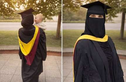 A woman wearing a niqab and a graduation cap and gown.