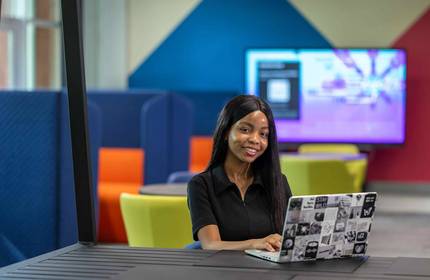 Data Science student with laptop