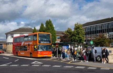 Cyncoed campus bus and bus shelter on a sunny day