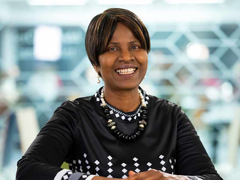 Headshot of Cardiff School of Management staff member