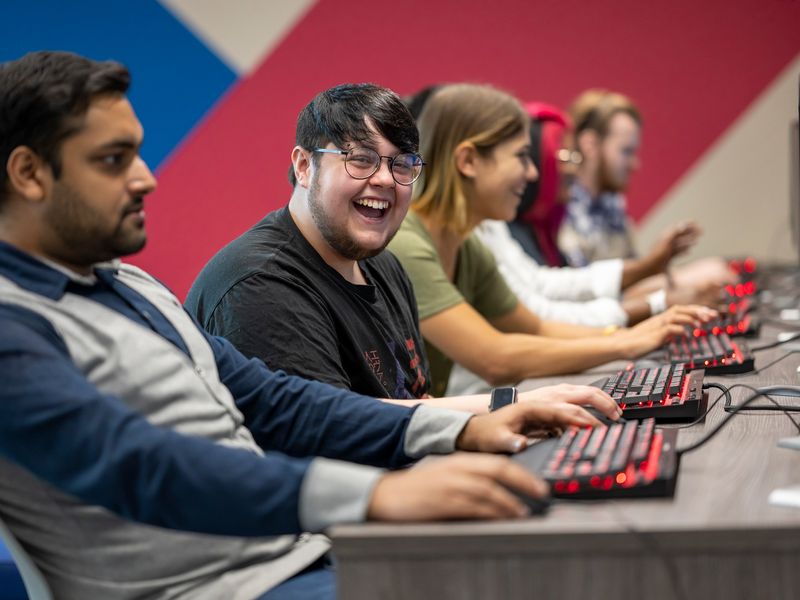 Row of students sat at their computer desks