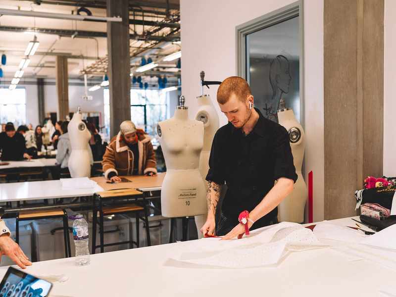 Fashion Design student working with clothing pattern