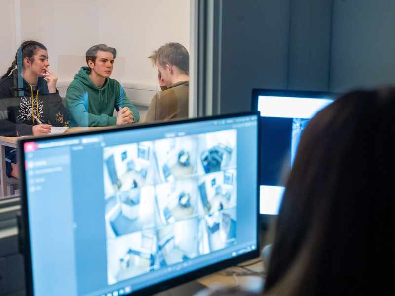 Students in Crime House observation suite