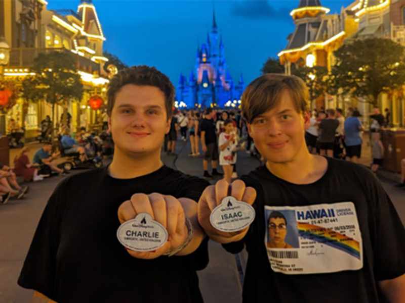 Two people at a Disney theme park.