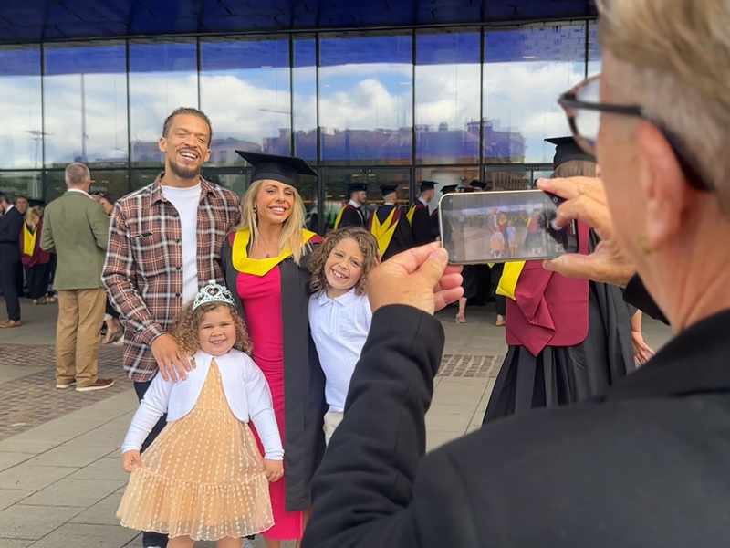 Harriet Wills-Adams and her family photographed at Graduation