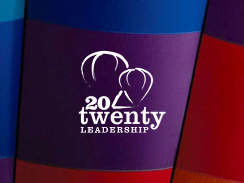 The Twenty Twenty Leadership logo displayed prominently against a vibrant, colourful background.