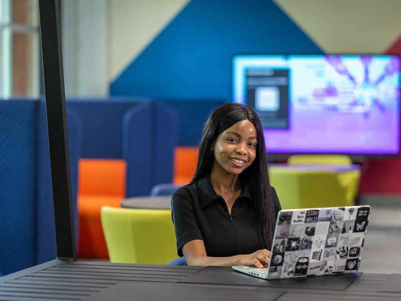 Data Science student with laptop