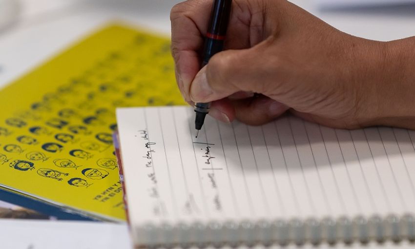 Notes being taken by an individual