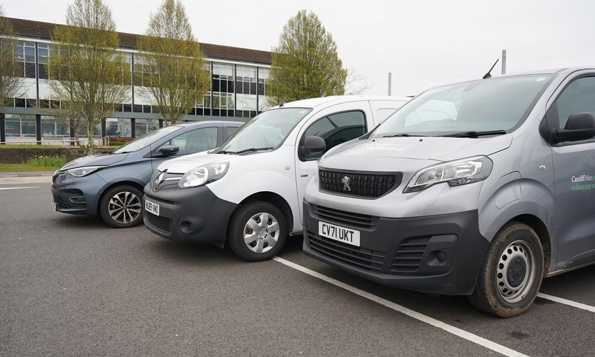 A row of parked electric vehicles