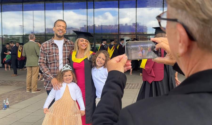 Harriet Wills-Adams and her family photographed at Graduation