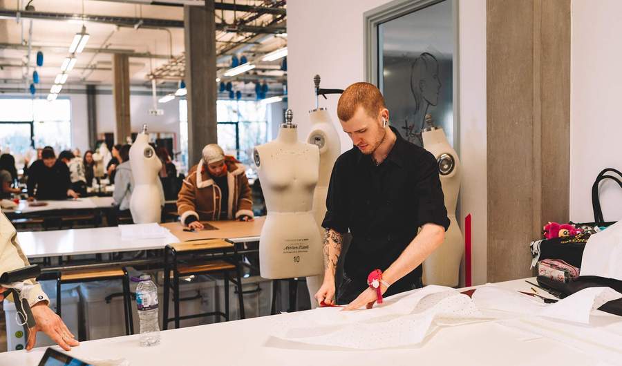 Fashion Design student working with clothing pattern