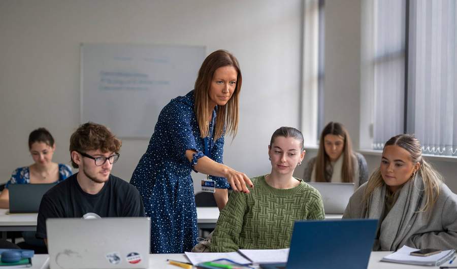 Social Work lecturer with students