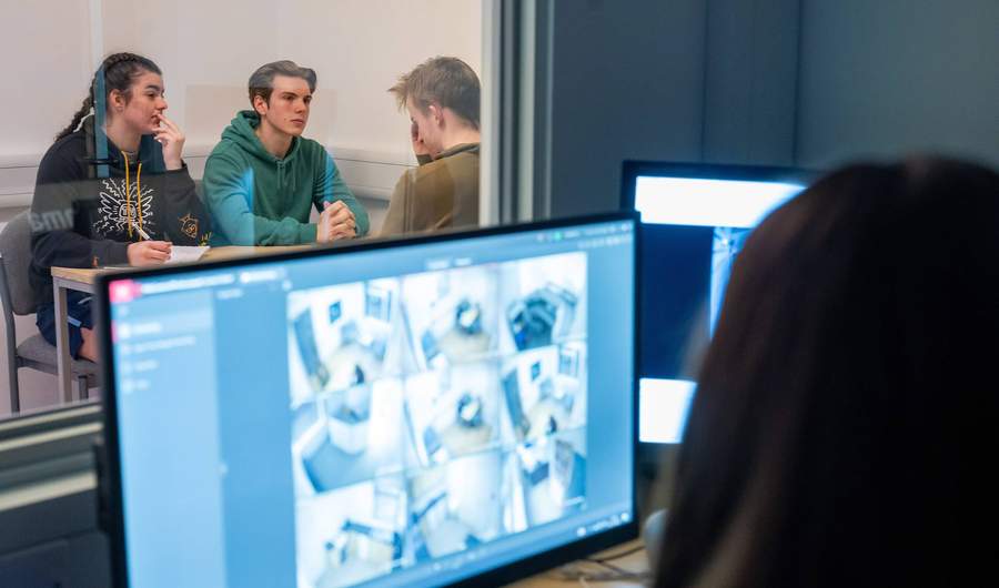 Students in Crime House observation suite