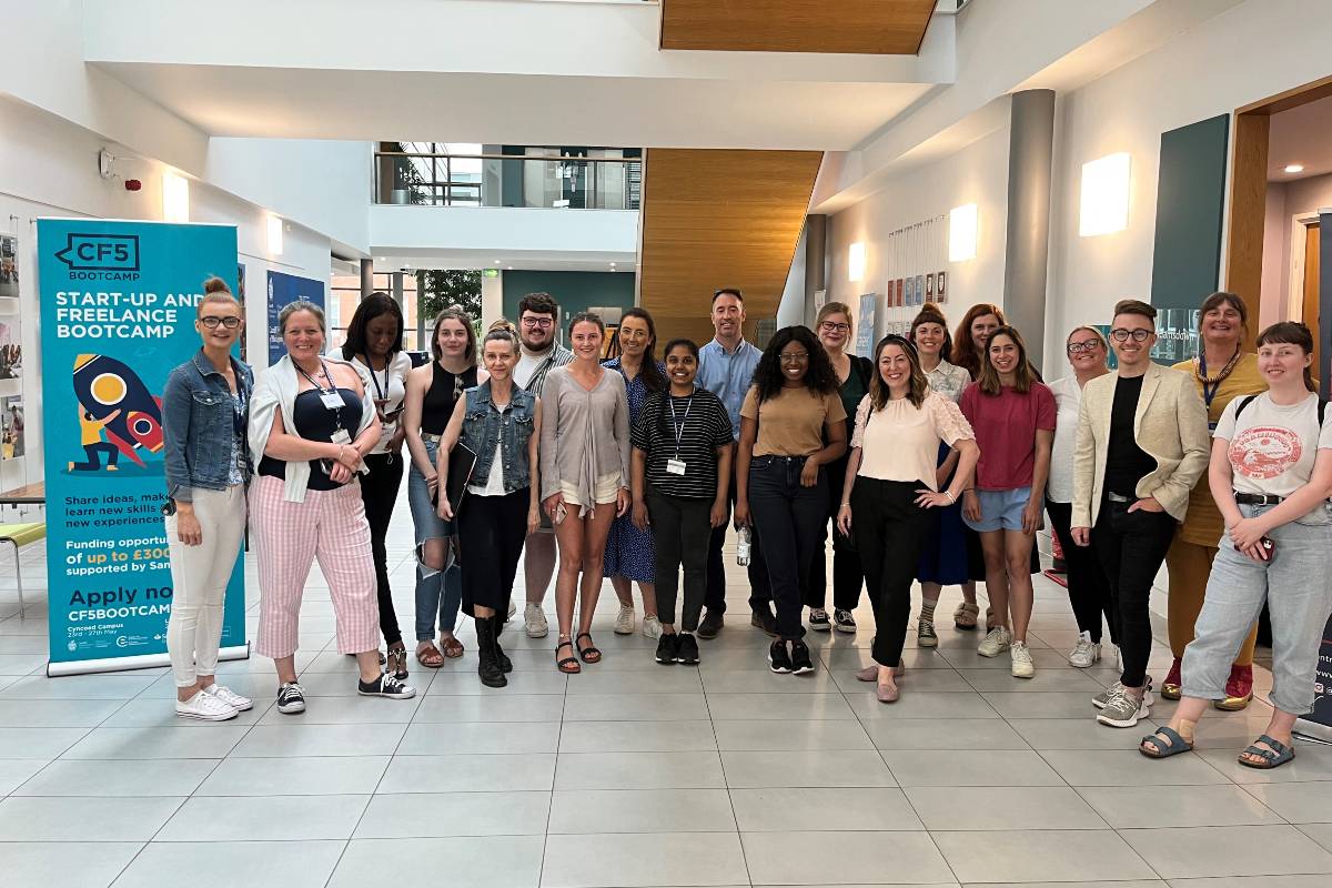 Business Bootcamp attendees stand together for a photograph in the Cardiff Met School of Management