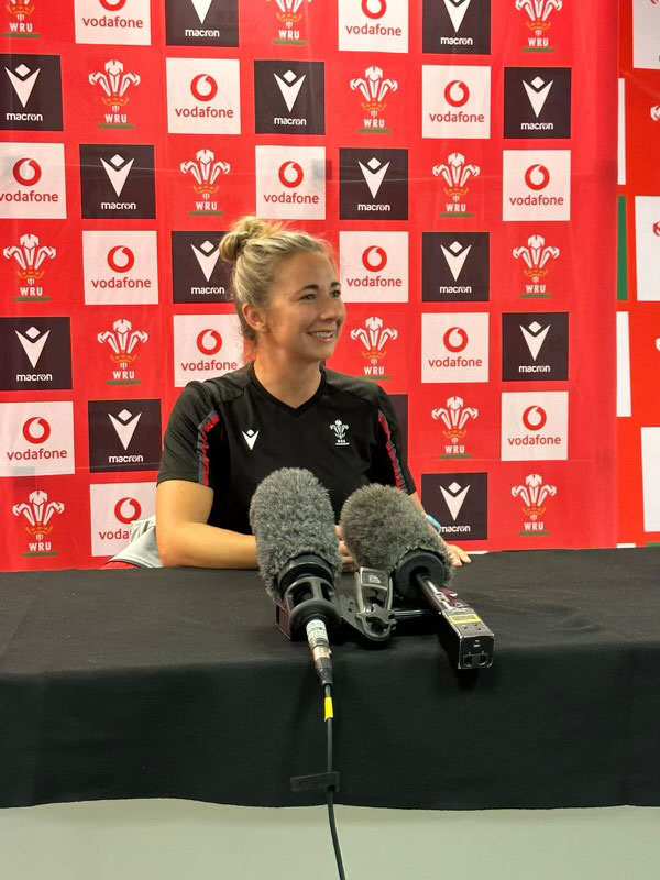 Elinor Snowsill sat in front of microphones during Welsh Rugby Union press conference