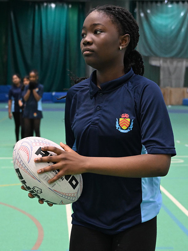 School child plays rugby during Cardiff Met Open Campus event