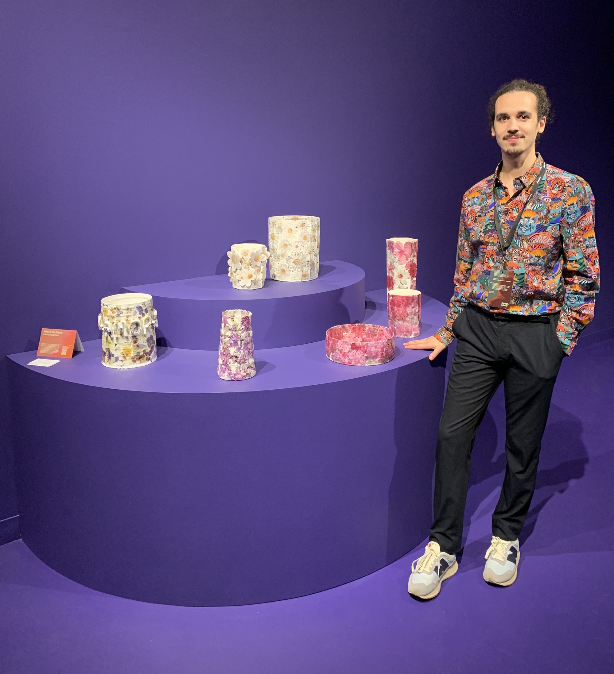 Toni De Jesus with their artwork at the LJ. Lohmann Gallery at Design Miami