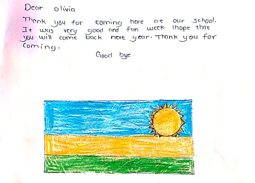 Hand-written thank you message with flag of Rwanda