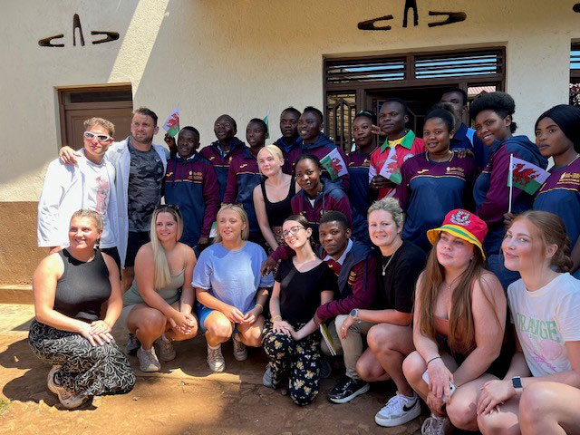 Cardiff Met Students photographed with Rwandan teachers and school staff