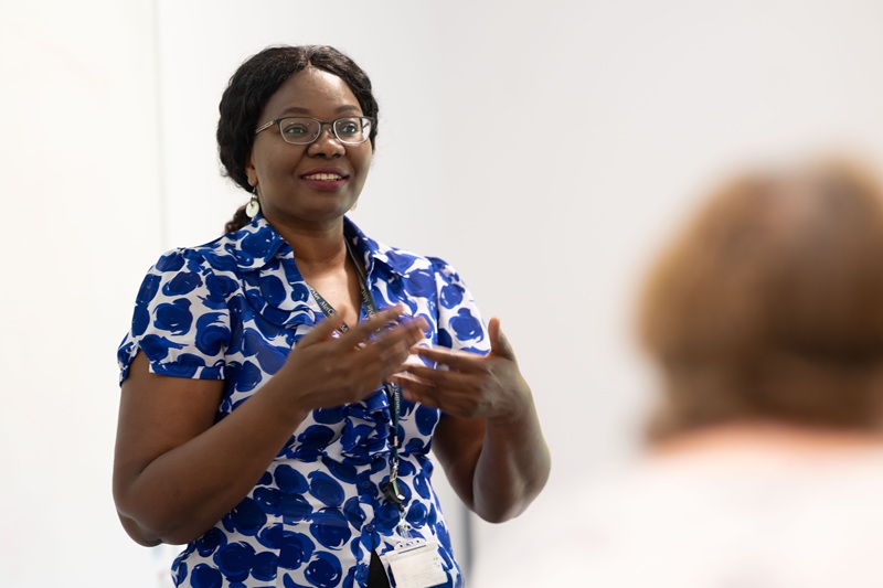 Widening Access teacher addresses classroom of adult learners