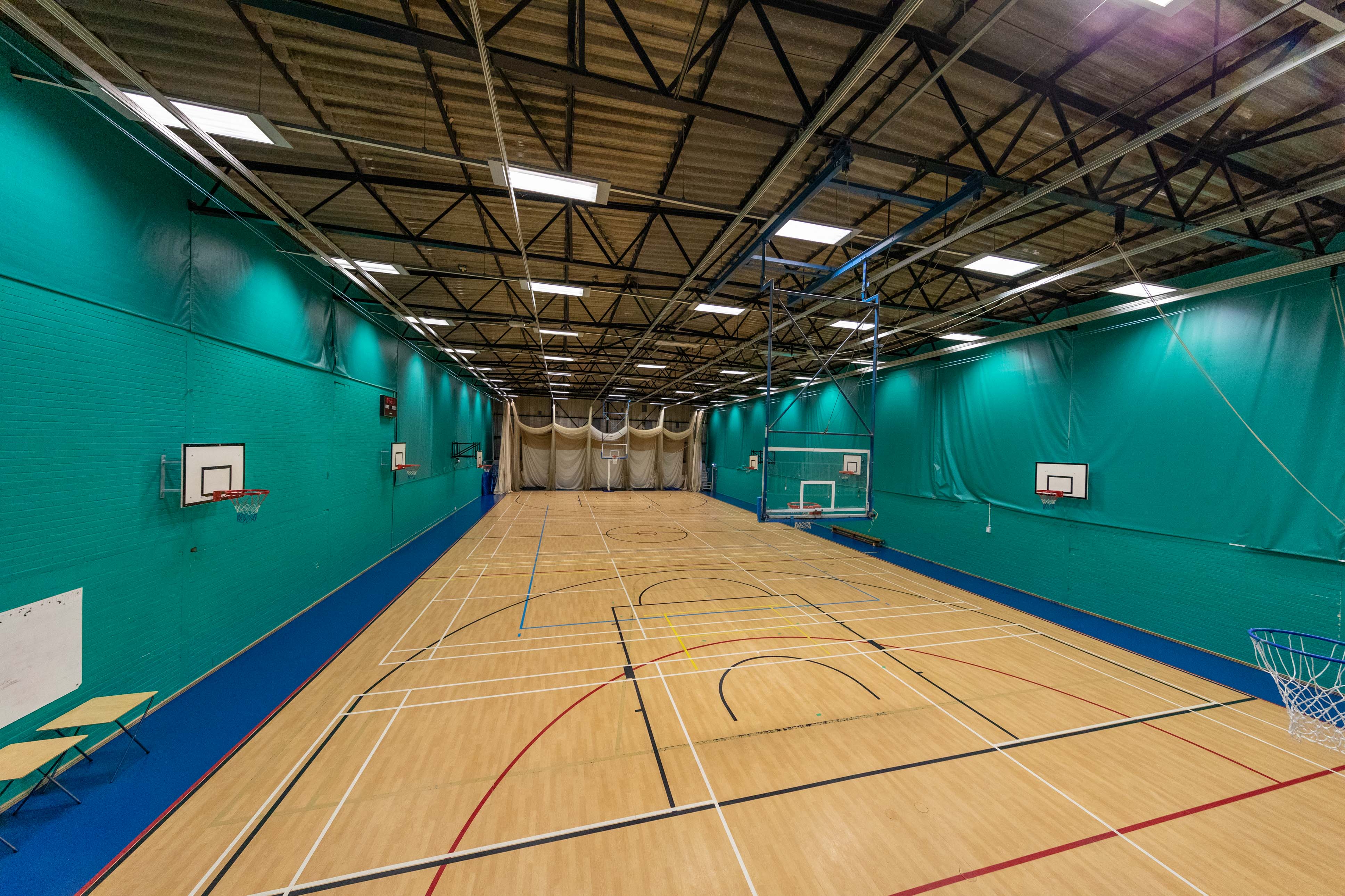 An aerial view of the illuminated sports hall